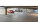 Well-lit and spacious parking garage, with designated parking spots at 100 Park Ave # 907, Denver, CO 80205
