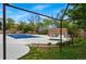 Beautiful community pool and hot tub area with mature trees and landscaping, great for outdoor living at 100 Park Ave # 907, Denver, CO 80205