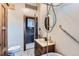 Bathroom with a vintage-style vanity, toilet, and a shower with a grab bar for accessibility at 1229 Josephine St, Denver, CO 80206