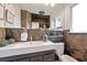 Modern bathroom with stylish vanity, slate-tile shower, and contemporary fixtures at 2835 N Monaco Pkwy, Denver, CO 80207