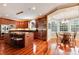 Stunning kitchen featuring cherry cabinets, stainless steel appliances, and a large island with seating at 2916 Hiwall Ct, Castle Rock, CO 80109