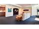 Relaxing living area with comfortable seating and an adjoining wet bar for easy entertaining at 2916 Hiwall Ct, Castle Rock, CO 80109