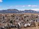 Sweeping aerial view captures the neighborhood, landscape, and the mountain view at 277 S Taft Ct # 54, Louisville, CO 80027