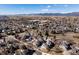 Stunning aerial view of community with nearby mountains and well-maintained landscaping at 277 S Taft Ct # 54, Louisville, CO 80027