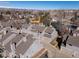 Close aerial view of townhomes showing the roofs, garages, and driveway at 277 S Taft Ct # 54, Louisville, CO 80027