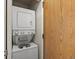Efficient laundry room with stacked washer and dryer maximizing space and convenience at 277 S Taft Ct # 54, Louisville, CO 80027