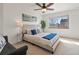 Relaxing bedroom retreat with a queen-sized bed, stylish lamps, and a soothing color palette at 277 S Taft Ct # 54, Louisville, CO 80027