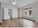 Bright bedroom features light wood flooring and a large window for plenty of natural light at 1409 Carlyle Park Cir, Highlands Ranch, CO 80129