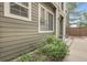 View of the building's exterior, showcasing the siding, windows, and landscaping at 1409 Carlyle Park Cir, Highlands Ranch, CO 80129