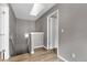Bright hallway with wood floors and recessed lighting leading upstairs at 1409 Carlyle Park Cir, Highlands Ranch, CO 80129