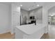Beautiful kitchen with stainless steel appliances and a bright white countertop island at 1409 Carlyle Park Cir, Highlands Ranch, CO 80129