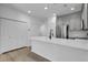 Open kitchen with a large island and stainless steel appliances at 1409 Carlyle Park Cir, Highlands Ranch, CO 80129