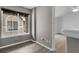 Home office with large window providing natural light, and wood flooring at 1409 Carlyle Park Cir, Highlands Ranch, CO 80129