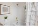 Bathroom features shower and decorative curtain for a relaxing atmosphere at 6274 S Iola Ct, Englewood, CO 80111