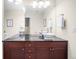 Modern bathroom featuring a double vanity with vessel sinks and stylish fixtures at 6274 S Iola Ct, Englewood, CO 80111