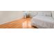 Cozy bedroom with hardwood floors, natural light, and stylish furnishings at 6274 S Iola Ct, Englewood, CO 80111