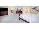 Large main bedroom with plush carpeting and generous space, creating a cozy and inviting retreat at 6274 S Iola Ct, Englewood, CO 80111