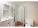 Cozy bathroom featuring a glass-enclosed shower and modern fixtures at 3756 S Mission Pkwy, Aurora, CO 80013