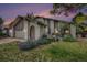 Charming home with manicured lawn, beautiful landscaping, and attached two-car garage at 3756 S Mission Pkwy, Aurora, CO 80013