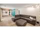 Cozy living space with plush sectional sofa, open to the kitchen at 3756 S Mission Pkwy, Aurora, CO 80013