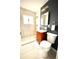 Modern bathroom showcasing an updated vanity and a walk-in shower, enhanced by contemporary lighting and stylish accents at 1853 S Urban Way, Lakewood, CO 80228