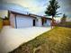 Inviting single story home featuring a well manicured lawn and a private drive at 1853 S Urban Way, Lakewood, CO 80228
