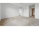 Spacious carpeted bedroom with white trim and a ceiling fan at 5574 W 72Nd Dr, Arvada, CO 80003