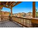 This lovely outdoor deck overlooks a tree-lined street in a residential neighborhood at 5574 W 72Nd Dr, Arvada, CO 80003
