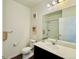 Modern bathroom features a sleek vanity, large mirror, and a shower with tiled walls at 9283 Twenty Mile Rd # 308, Parker, CO 80134