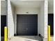Garage exterior features a modern door design and convenient access for parking at 9283 Twenty Mile Rd # 308, Parker, CO 80134