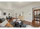 Inviting living room showcasing hardwood floors and seamless flow to other living spaces at 1031 S Pennsylvania St, Denver, CO 80209