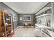 Well-lit office space with shelving, ceramic tile flooring, and modern décor at 1031 S Pennsylvania St, Denver, CO 80209