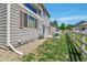 Backyard with fencing, patio, and partial gravel landscaping at 14944 E Archer Cir, Aurora, CO 80012