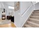 Cozy staircase connects to an open-plan living space at 14944 E Archer Cir, Aurora, CO 80012