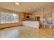 Bright living area featuring wood floors and a large window at 9784 W Euclid Dr, Littleton, CO 80123