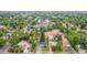 Lush aerial view of the neighborhood showcases tree-lined streets and well-maintained homes, providing a serene living environment at 8450 W 13Th St, Lakewood, CO 80215