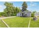 Charming single Gathering home featuring a well-manicured lawn and delightful curb appeal at 8450 W 13Th St, Lakewood, CO 80215