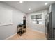 Eat in kitchen featuring stainless steel appliances, hardwood floors, and natural light at 1243 Monroe St, Denver, CO 80206