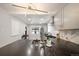 Modern kitchen features sleek black countertops, stainless steel appliances, and stylish herringbone backsplash at 1243 Monroe St, Denver, CO 80206
