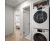 Convenient laundry area with stacked washer and dryer off of bedroom at 1243 Monroe St, Denver, CO 80206