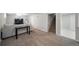 The finished basement has neutral paint, neutral carpet, and access to other finished spaces at 1243 Monroe St, Denver, CO 80206