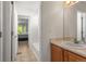 Bathroom view showing vanity sink and a bathtub and shower with tile surround at 9162 W Unser Ave, Littleton, CO 80128