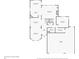 First floor plan with a kitchen, living room, dining room, and garage at 9162 W Unser Ave, Littleton, CO 80128