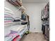 Well-organized walk-in closet with ample shelving and storage space at 9162 W Unser Ave, Littleton, CO 80128