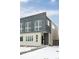 Modern two-story home with gray siding and brick accents at 1576 W Maple Ave, Denver, CO 80223