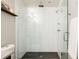 Large walk-in shower with glass enclosure and modern fixtures at 1576 W Maple Ave, Denver, CO 80223