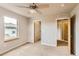 Bright bedroom with two doors and ceiling fan at 4137 Clifton Ct, Boulder, CO 80301