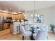 Bright kitchen featuring stainless steel appliances, light wood cabinets, and an adjacent dining area at 4137 Clifton Ct, Boulder, CO 80301