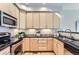 Kitchen featuring stainless steel appliances, granite countertops, and ample cabinet space at 4137 Clifton Ct, Boulder, CO 80301