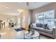 Comfortable living room with natural light, hardwood floors, and neutral décor at 4137 Clifton Ct, Boulder, CO 80301